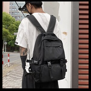 背包新款韩版牛津布休闲双肩背包时尚男女黑色书包潮图片