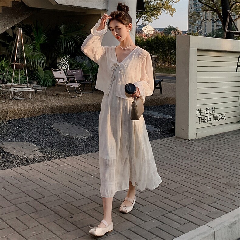 法式长袖连衣裙女2024夏新款慵懒度假风海边开衫长裙图片