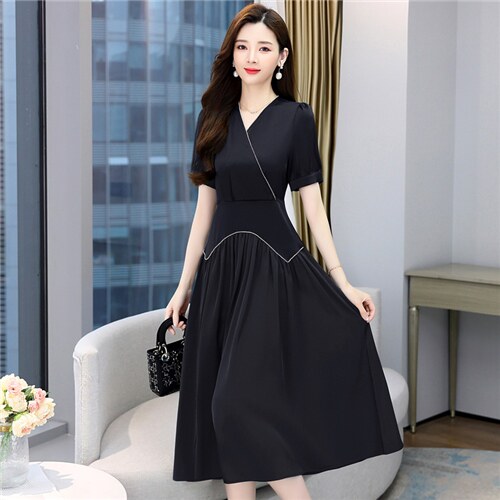 2023年夏季韩版时尚休闲修身钉珠中长款连衣裙图片