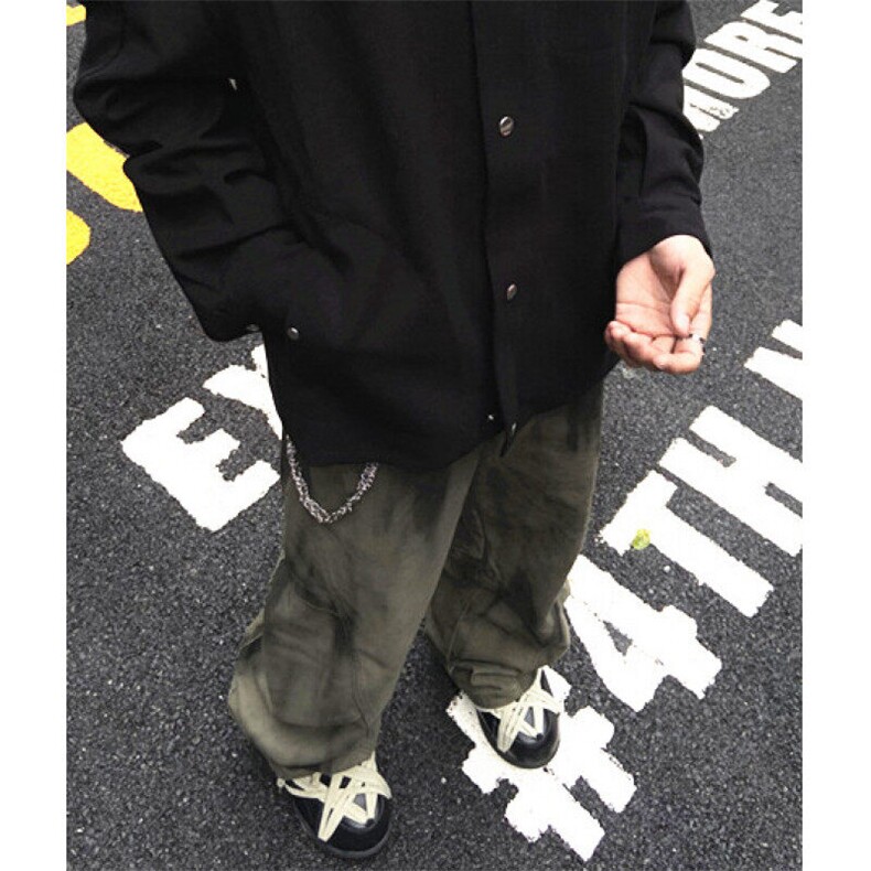 设计感宽松褶皱拼接做旧牛仔裤男潮牌休闲阔腿廓形弯刀裤 NA284图片