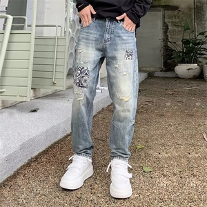 春季休闲痞帅水洗复古涂鸦印花牛仔裤男直筒宽松锥形裤子NK558