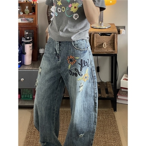美式复古花卉刺绣弯刀牛仔裤女破洞设计感直筒裤小众裤子图片