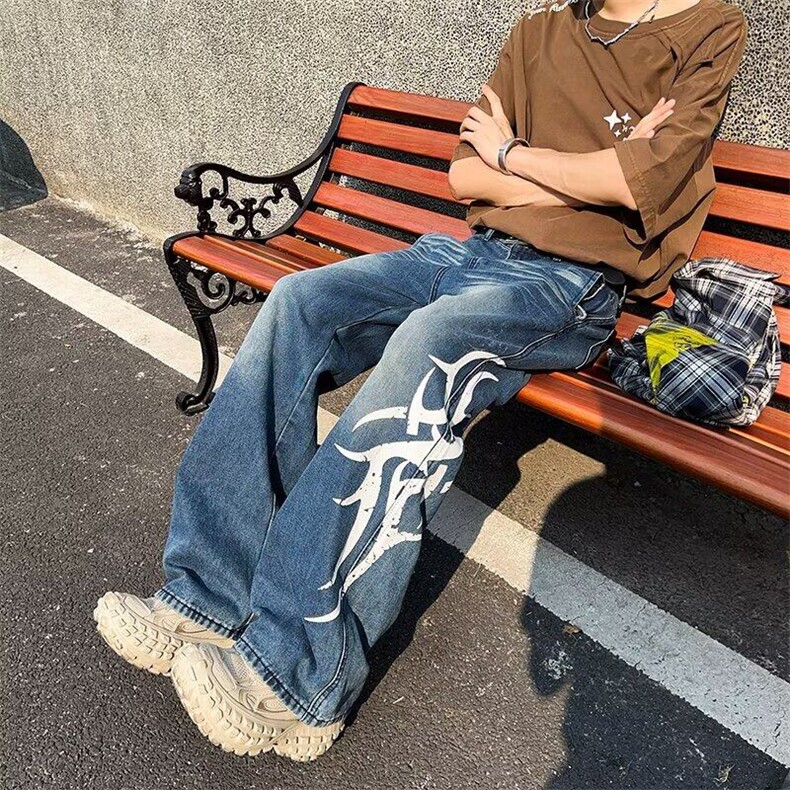 美式复古水洗印花牛仔裤潮流新款宽松休闲百搭弯刀裤图片