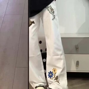 美式高街花朵印花刺绣牛仔裤男女春秋设计感弯刀裤重磅痞帅直筒裤图片