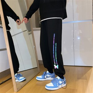 K3021/P45春装2023新蝴蝶反光夜光束脚运动休闲裤卫裤男控68图片