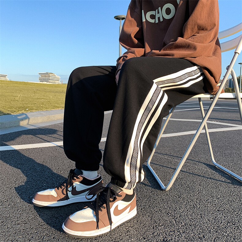 K3166-P45秋装潮流宽松中性男女情侣侧边棋盘格织带撞色休闲卫裤,男装休闲裤,电商A009A（原A058A）