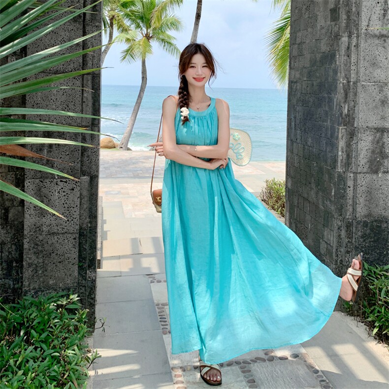 蓝色挂脖无袖连衣裙女2025夏新款海边度假风宽松显瘦绝美气质长裙图片