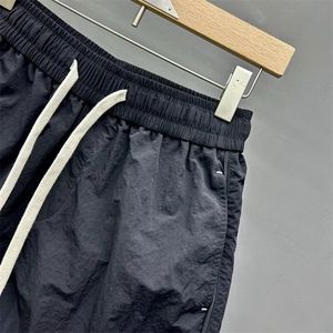 夏季男士短裤潮牌宽松薄款冰丝速干沙滩裤时尚字母印花痞帅运动裤图片