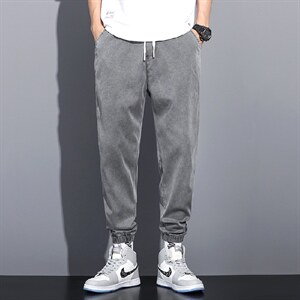 YK968-P45 新品牛仔裤男士秋季潮男宽松束脚四季哈伦休闲九分裤男图片