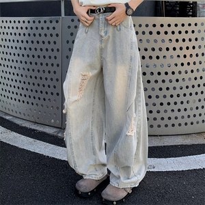 美式高街设计感破洞牛仔裤男女夏季潮牌做旧水洗阔腿裤vibe弯刀裤图片