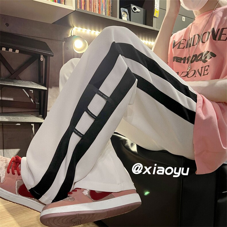 XZ616 新款夏秋衔接华夫格拼接贴标休闲裤 TY366 P45控58图片