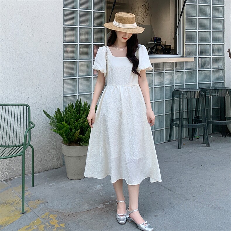 《大货已出》后背镂空珍珠时尚休闲连衣裙，女装连衣裙，MQ