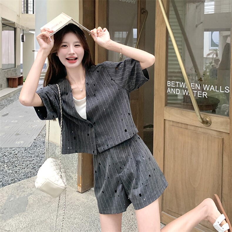 韩版时尚设计感西装上衣套装女2025夏季新款显瘦镂空阔腿裤两件套图片