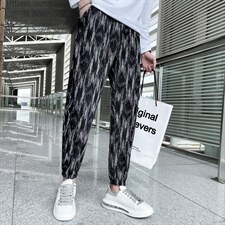 2025秋冬新款丝绒褶皱休闲裤男韩版潮流网红斑马纹社会小伙裤子图片