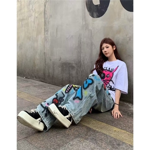 大码美式复古涂鸦印花牛仔裤女2025新款辣妹宽松显瘦直筒阔腿长裤图片
