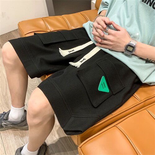 K6070/P35夏季新款立体多口袋工装松紧系绳短裤男大码中裤男裤子图片