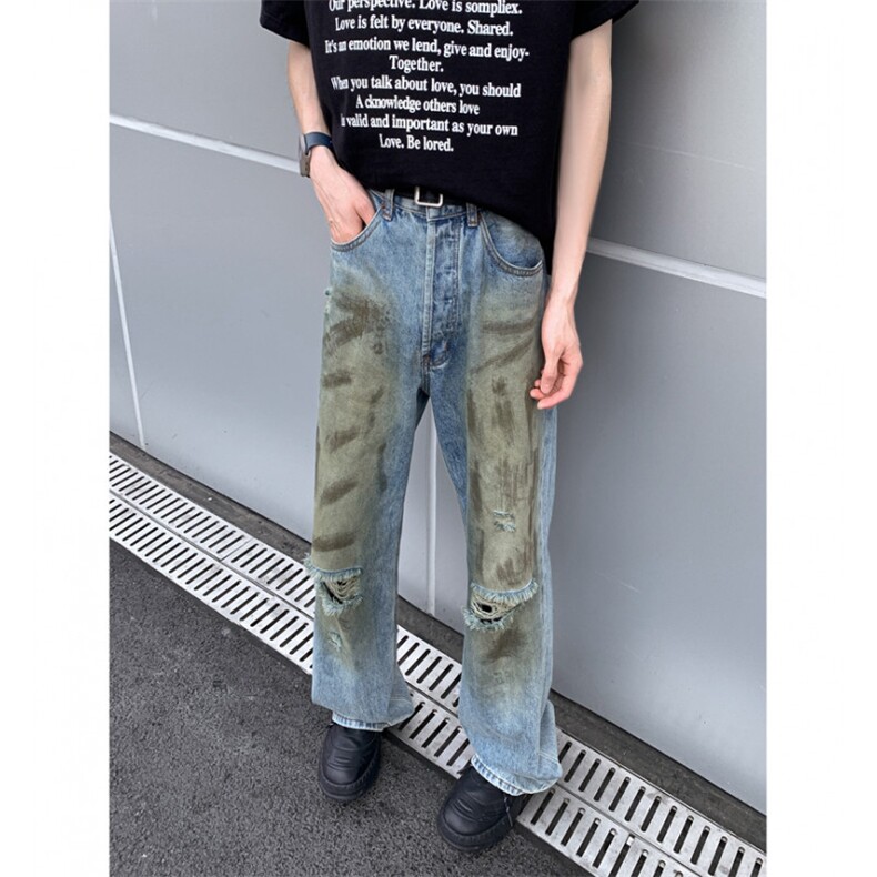 夏季新款破洞设计感牛仔裤复古潮牌美式水洗宽松脏脏裤图片