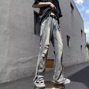 潮牌破洞牛仔裤男2025春秋款高街设计感薄款宽松长裤拉链开叉裤子图片