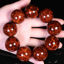 Hainan Huanghua Pear hand string male 2 0 bracelet female gall tumor scar pattern grimace face eye old material sea yellow wood pearl jewelry