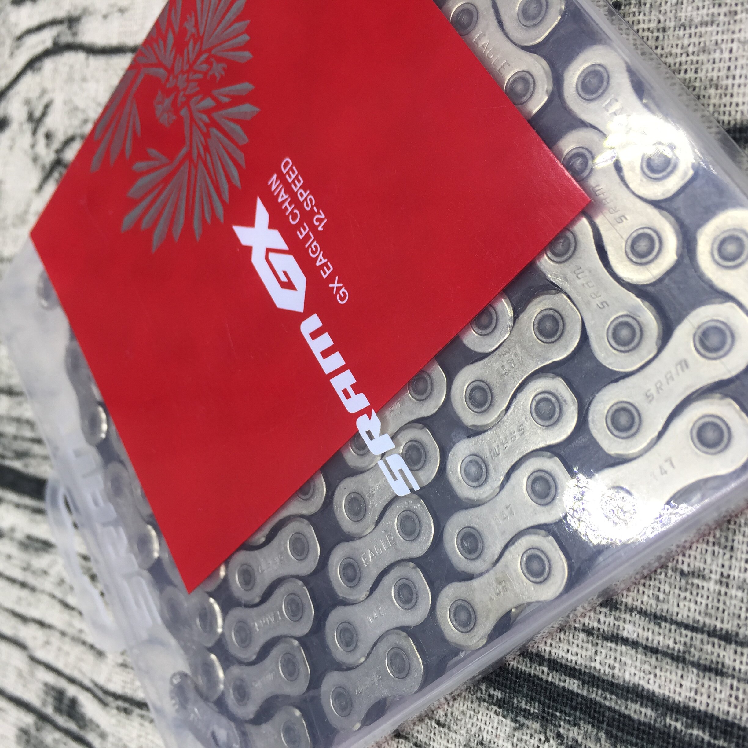 Boxed SRAM speed link GX eagle 12 speed silver 126M knots of climbing car chain