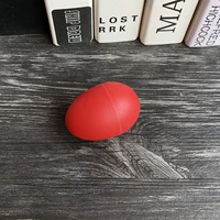 Пластиковое яйцо с красным песком