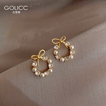 South Korean small butterfly knot earrings woman 2022 new wave net red temperamental ear nail 925 pure silver silver needle earring