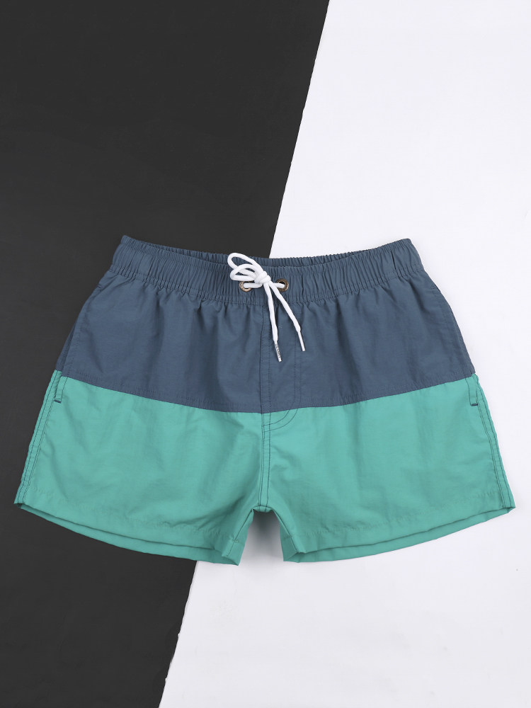 Swimming trunks Men's loose flat angle beach swimming trunks Sports and leisure running swimming two-way shorts lined beach pants