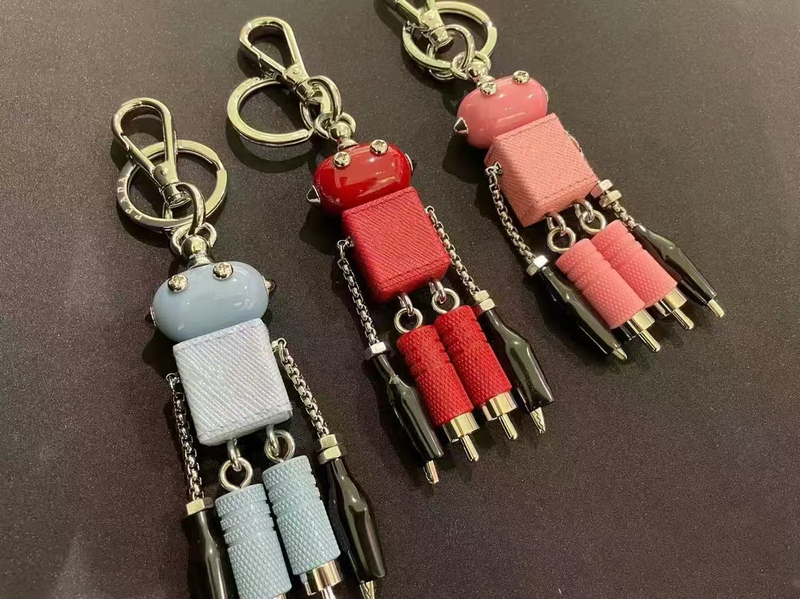 European and American Style Classic Triangular Robot Keychain, French Light Luxury Niche Design, High-End Bag Accessory European and American Style Classic Triangular Robot Keychain, French Light Luxury Niche Design, High-End Bag Accessory