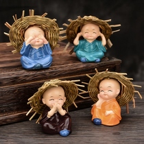 Creative car ornaments car shaking head four no small monk Bao Ping Ping A cute car interior decorations