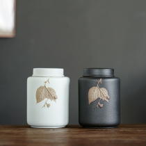 Round coarse ceramic black and white ceramic tea cans Maple leaf sealed cans travel storage cans tea cans manufacturers custom direct sales