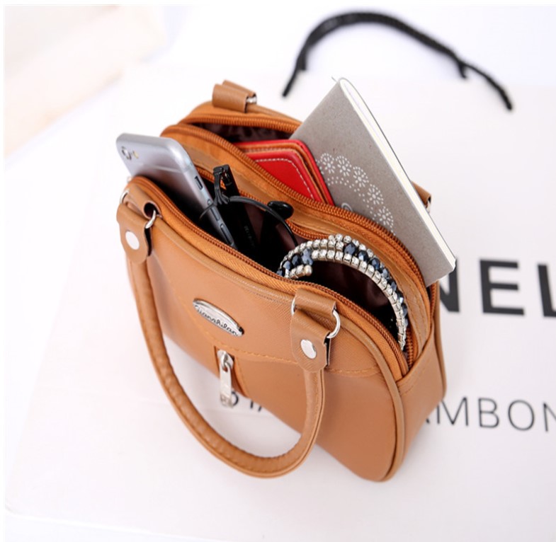 Thời trang mua sắm điện thoại di động thay đổi ly hợp mẹ trung niên còng tay mini túi nữ trung niên xách tay nhỏ túi coach nữ