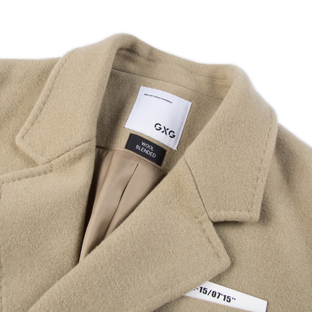 GXG Men's 15th Anniversary Series Khaki Long Coat ແມ່ນກວ້າງ, ທັນສະໄຫມ, ສະດວກສະບາຍແລະອົບອຸ່ນ, ຜະລິດຕະພັນລະດູຫນາວໃຫມ່ສໍາລັບປີ 2022