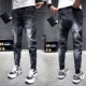Quần jean nam màu đen mùa xuân phiên bản Hàn Quốc của quần chân trẻ trung hợp thời trang quần nam mùa xuân và mùa thu quần harem - Quần jean