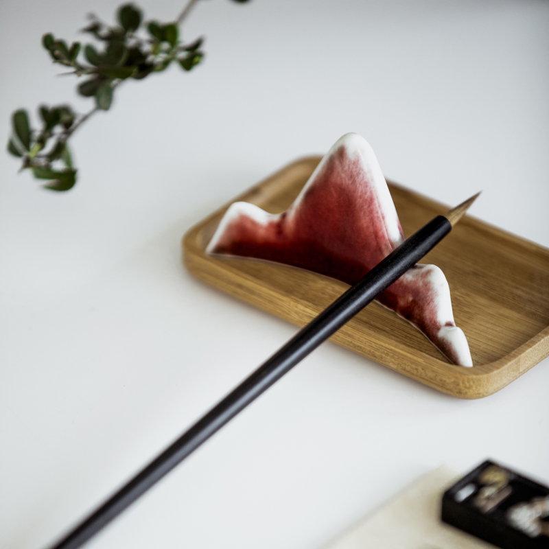 Vegetation school ceramics false camellia is put value frame penholder chopsticks frame ChaZhen ChaBo zero with kung fu tea set value of the tea taking