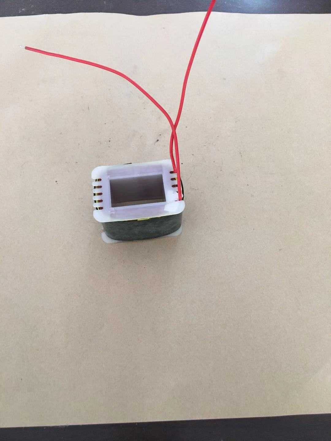 Vertical packaging machine vibrator coil