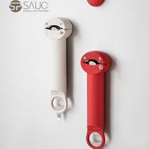 Multi-functional magnetic opener to open the cap open the cap twist the cap open the bottle beer opener stick to the refrigerator and twist the cap