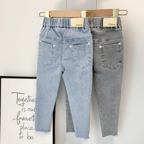 Childrens spring and autumn jeans Little boy heed-up slim version of small leggings female baby Han version elastic tight pencil pants