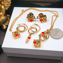 (Clearance is out of stock at any time) niche Luojia hollow letter earring necklace earrings copper gold-plated personality men and women