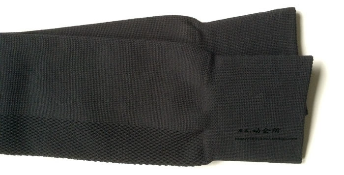 Vớ bóng đá nam màu đen dài vớ cotton dày khăn dưới đầu gối vớ vớ chống trượt vớ bóng đá thể thao