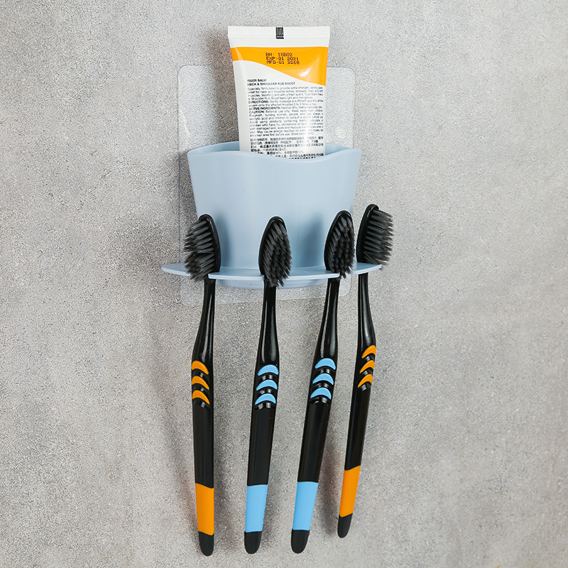 Powder room toothbrush rack rack wall-mounted punch-free paste suction wall-type simple creative storage rack