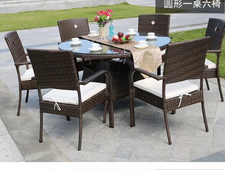 Wicker ghế một bàn sáu ghế tròn bàn mây bàn ghế kết hợp đồ gỗ ngoài trời ban công bàn ghế sân khách sạn chống chuột bàn ghế - Bàn ghế ngoài trời / sân bàn cà phê ngoài trời