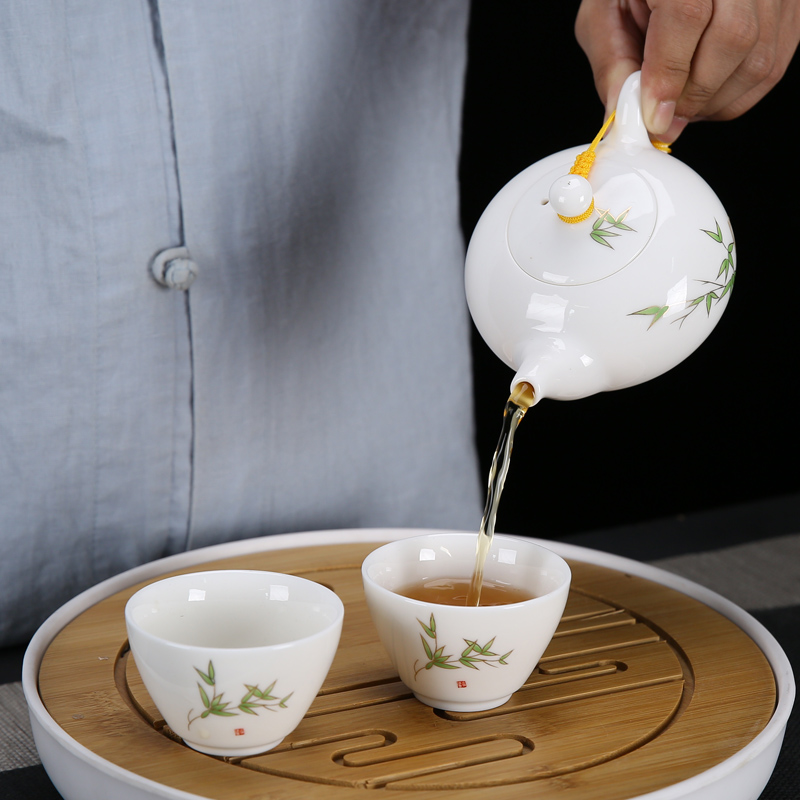 Fujian macros suet jade porcelain kung fu tea set suit household dehua white porcelain tea set teapot teacup of a complete set of gift box