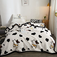 Черно -белая корова