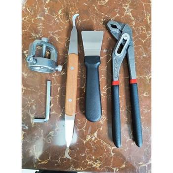 Range hood appliance cleaning blade scraper