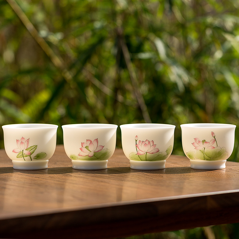 Tang dehua white porcelain shed suet jade hand draw lotus tea cup, bowl of household kung fu tea set personal sample tea cup