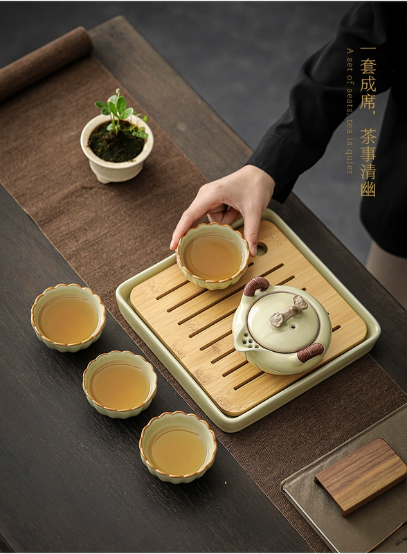 Màu Be Ru Lò Du Lịch Bộ Trà Cắm Trại Ngoài Trời Di Động Trà Gốm 1 Nồi 4 Ly Có Khay Trà Khô pha Khay bo am chen cao cap bộ tách trà gốm