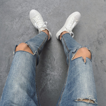 Attitude high street knife cut knee hole burrs nine points jeans Korean version of retro slim feet pants men