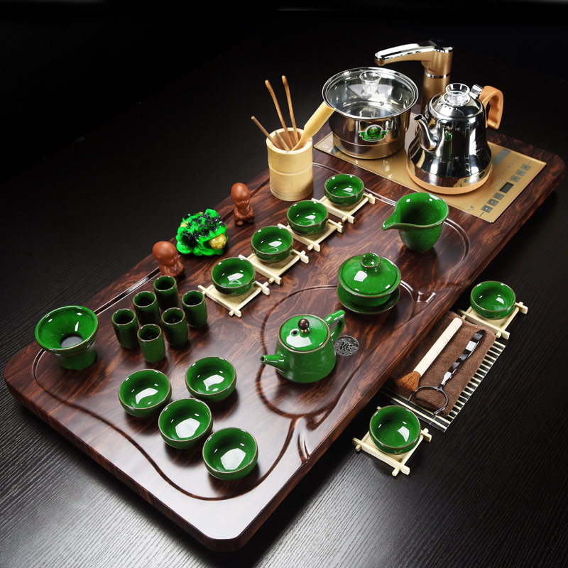 Violet arenaceous kung fu tea tea set household contracted electric magnetic furnace stage solid wood tea tray of a complete set of Chinese tea taking