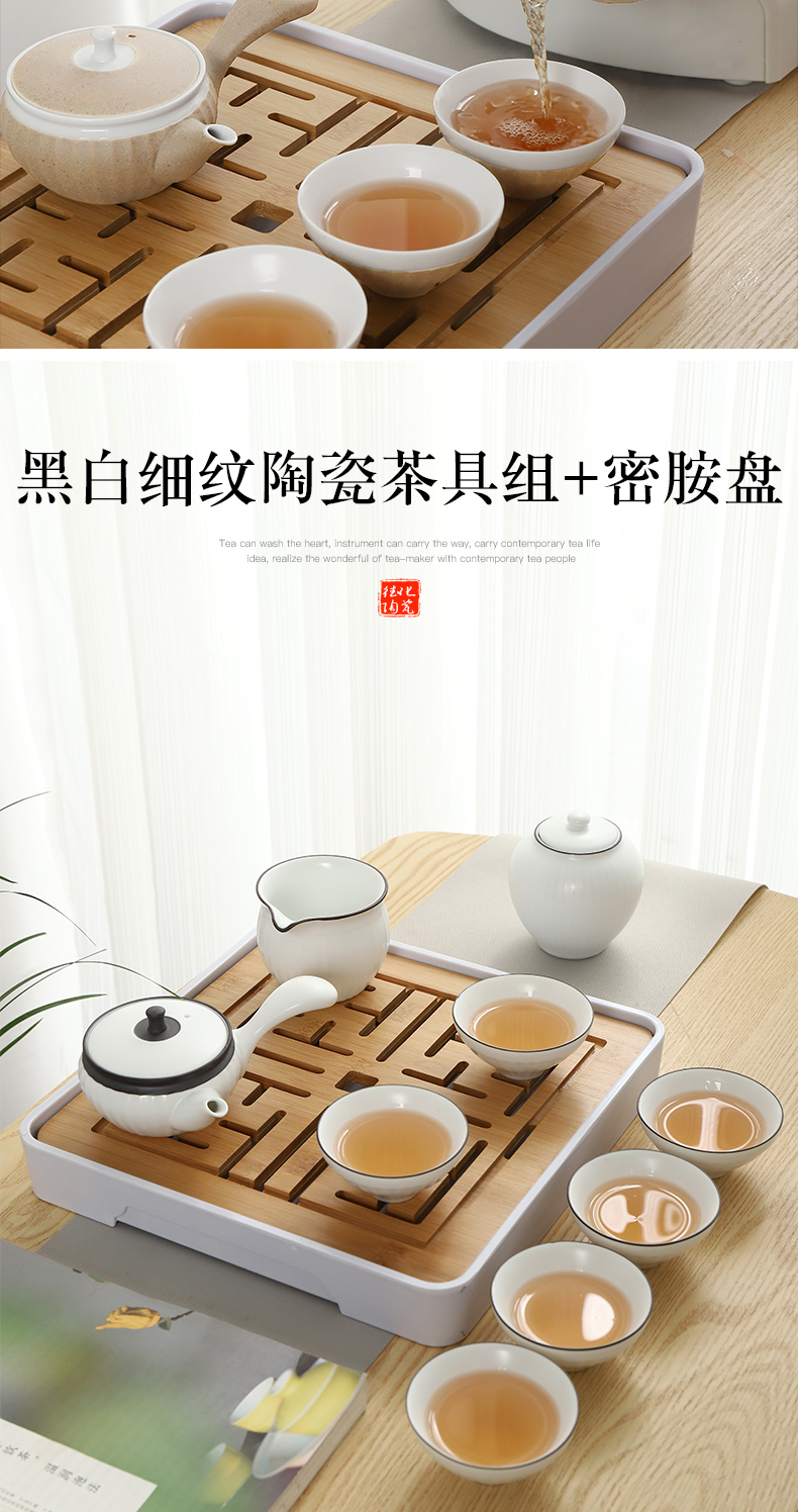 Tea set kung fu Tea set household, black and white ceramic electric TaoLu Japanese I sitting room is contracted a warm the teapot Tea tray