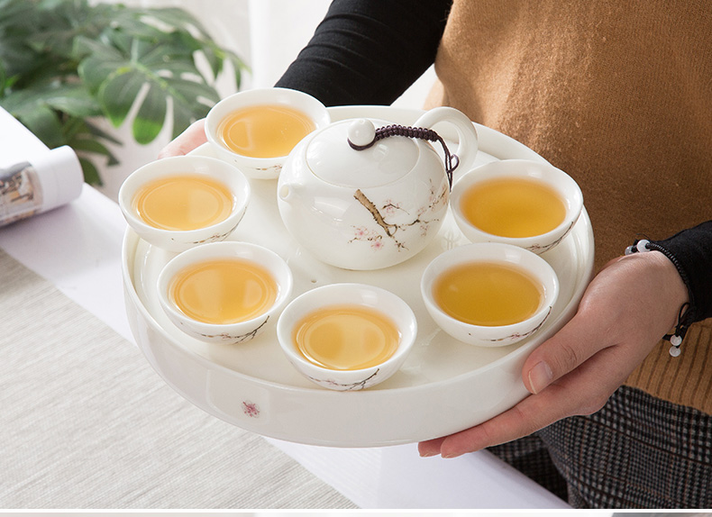 A complete set of dehua white porcelain suet jade suit household green kung fu tea set ceramic tea tray was contracted tea table